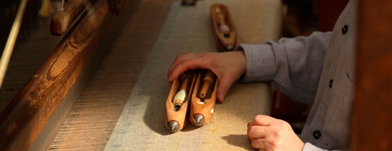 Weaving of Pashmina on a wooden loom – Traditional craftsmanship in Kashmir, India
